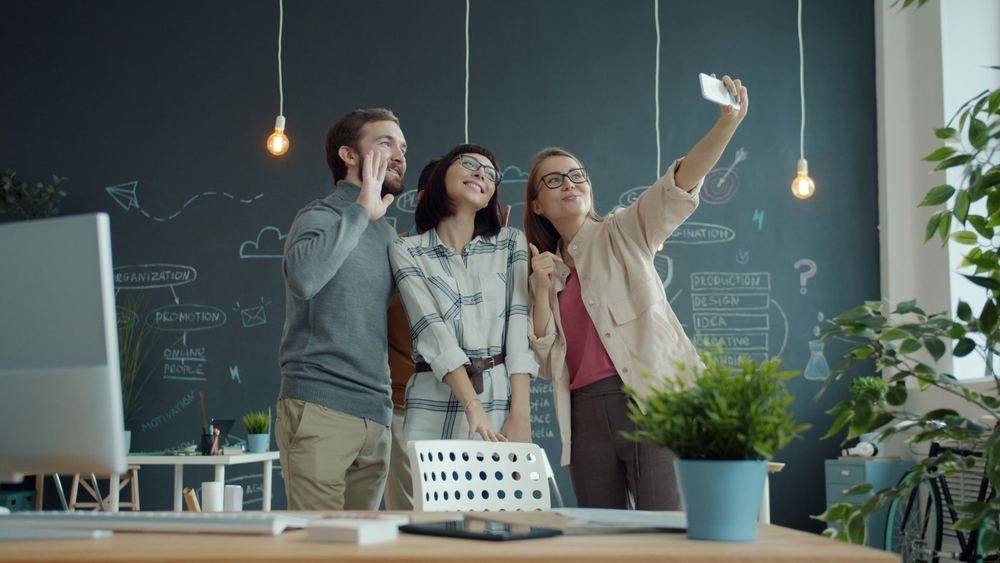 Team members working together in a bright office